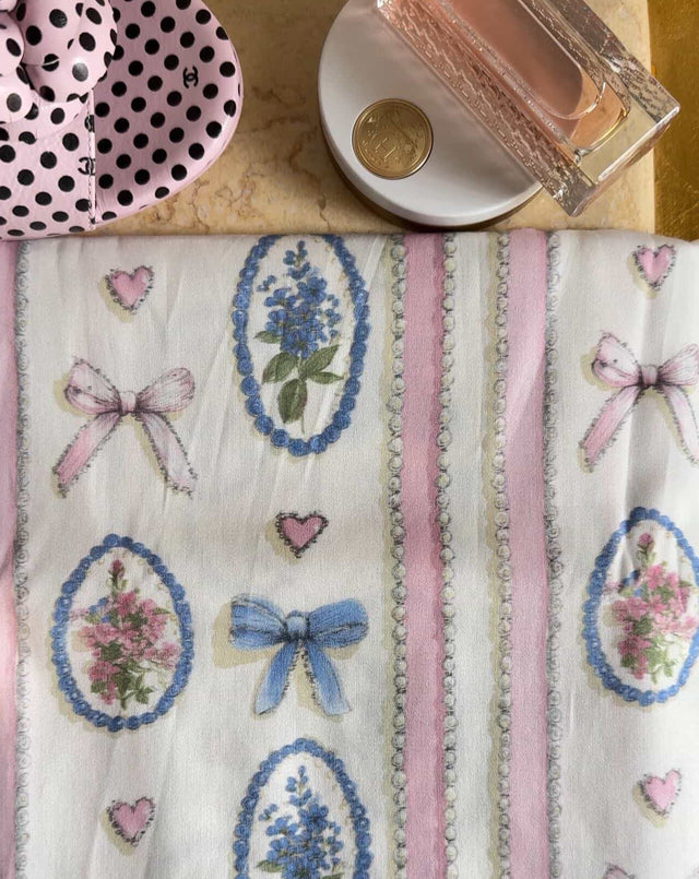 Heirloom printed pure cotton satin fabric — cameos, ribbons and pearls